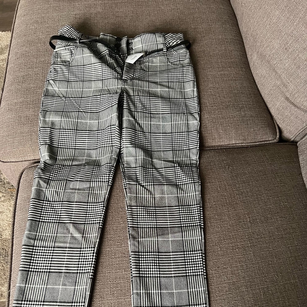 Size large (runs small) stretchy dress pants never worn.